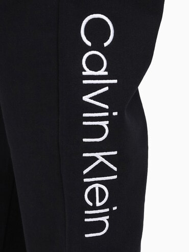 Calvin Klein カルバンクライン STNDRDロゴテリージョガーパンツ