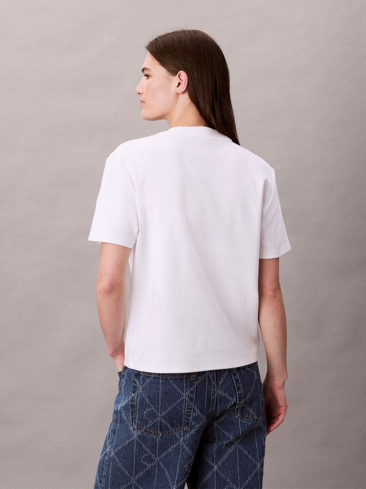 Tシャツ - エンブレムモノグラムモックネックTシャツ | カルバン