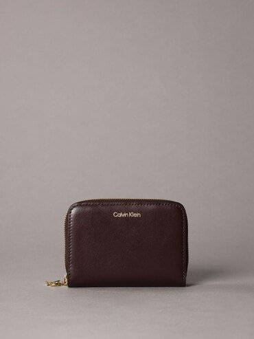 財布 - ミディアムフラップジップアラウンドウォレット | カルバン