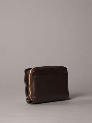 財布 - ミディアムフラップジップアラウンドウォレット | カルバン