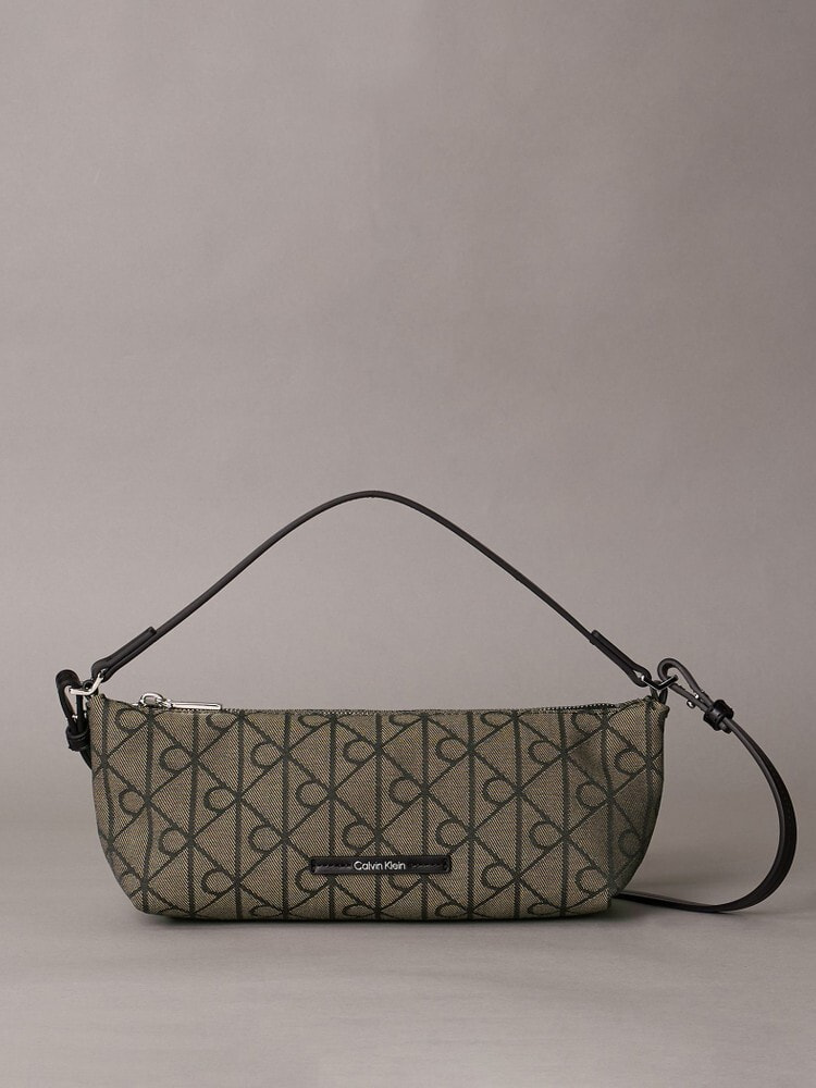 【新品】カルバンクライン アーカイブ フラップ ショルダーバッグ グレー Calvin Klein（カルバン・クライン）の「フラップロングウォレット