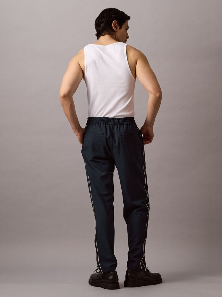 【一度だけ着用】トラックパンツ(ブラックLサイズ)平本選手着用定価28,000円 2点以上でさらに10%OFF】パンツ - リラックストラックパンツ
