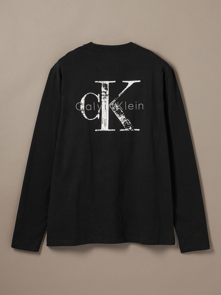 長袖Tシャツ - ディストレスモノグラムバックグラフィックTシャツ